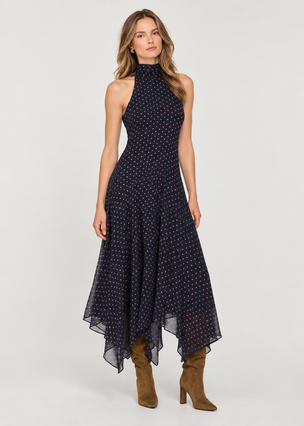 sleeveless high-neck midi dress with a navy base and small white and pink polka dots